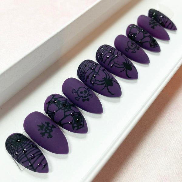 Load image into Gallery viewer, Purple Halloween Gothic press-on nails with black skull, web and spider artwork and 3D raindrop design, handmade by Illuminate by Liana Press-On Nails UK.