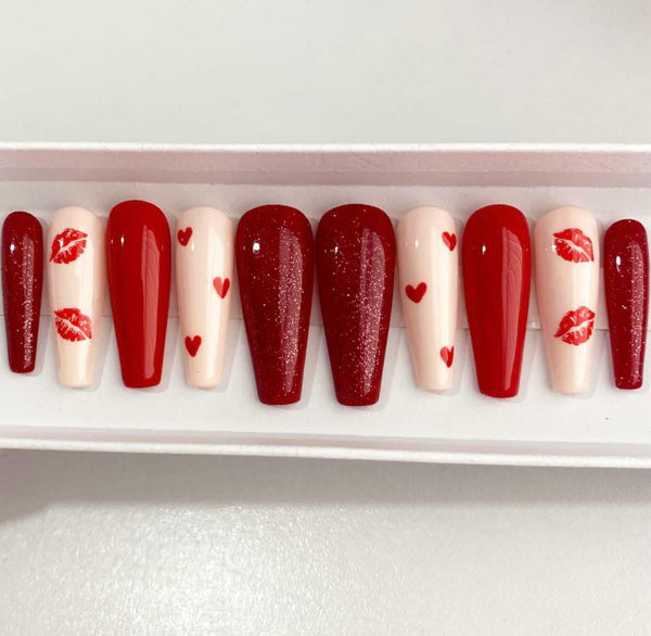 Load image into Gallery viewer, Set of Valentine's handmade false nails in red and cream with lips and hearts designs and red glitter