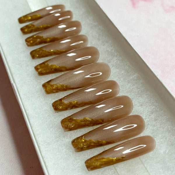 Load image into Gallery viewer, French tip long coffin handmade false nails in pastel brown-nude with burnished gold-copper tips, in a white presentation box.