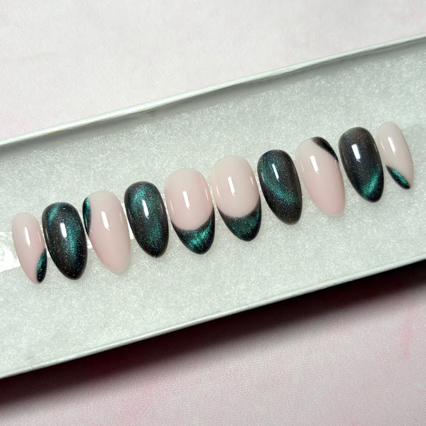 Load image into Gallery viewer, Almond shape handmade cat eye press-on nails in shades of grey and green, on a soft pink base.