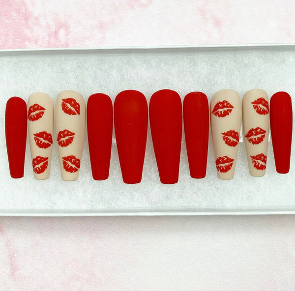 Load image into Gallery viewer, Valentine's handmade false nails in red and nude with a matte finish and lips designs, from Illuminate by Liana