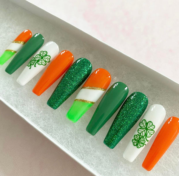 Load image into Gallery viewer, St Patrick's Day handmade press-on nails in green, orange, white and gold with lucky clover design and glitter
